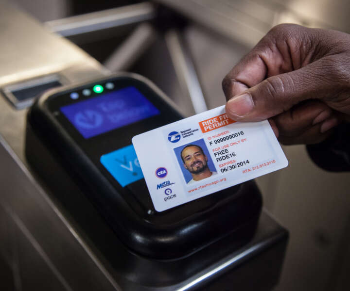 A person's Ride Free Permit card being used to pay for fare at Ventra turnstile. 