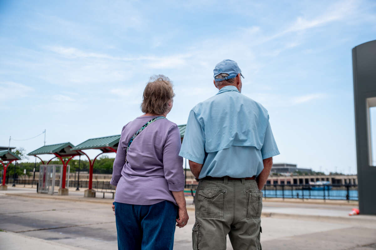 Elderly couple waiting outside at Navy Pier turnaround.
